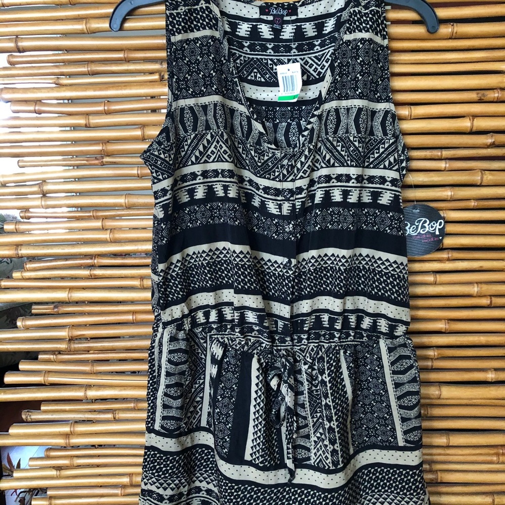 One piece button down Romper, tan and black